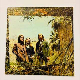 America – Hat Trick LP mit OIS (NM) - schallplattenparadis