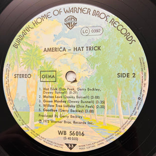 America ‎– Hat Trick LP mit OIS (NM) - schallplattenparadis