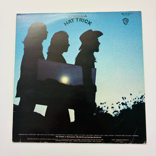 America ‎– Hat Trick LP mit OIS (NM) - schallplattenparadis
