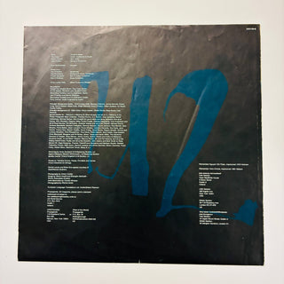 U2 – Achtung Baby LP mit OIS und Beiblatt (VG+) - schallplattenparadis