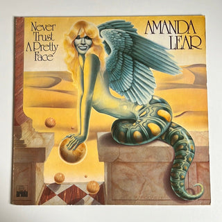 Amanda Lear ‎– Never Trust A Pretty Face LP mit OIS und Poster (VG+) - schallplattenparadis